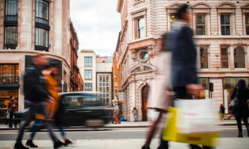 Shoppers walking through street